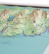 Raised relief three dimensional map of Acadia National Park, Maine, depicting Mount Desert Island, Schoodic Peninsula, and Isle au Haut in three-dimensional detail. The map shows mountains, valleys, lakes, and the coastline of the park.
