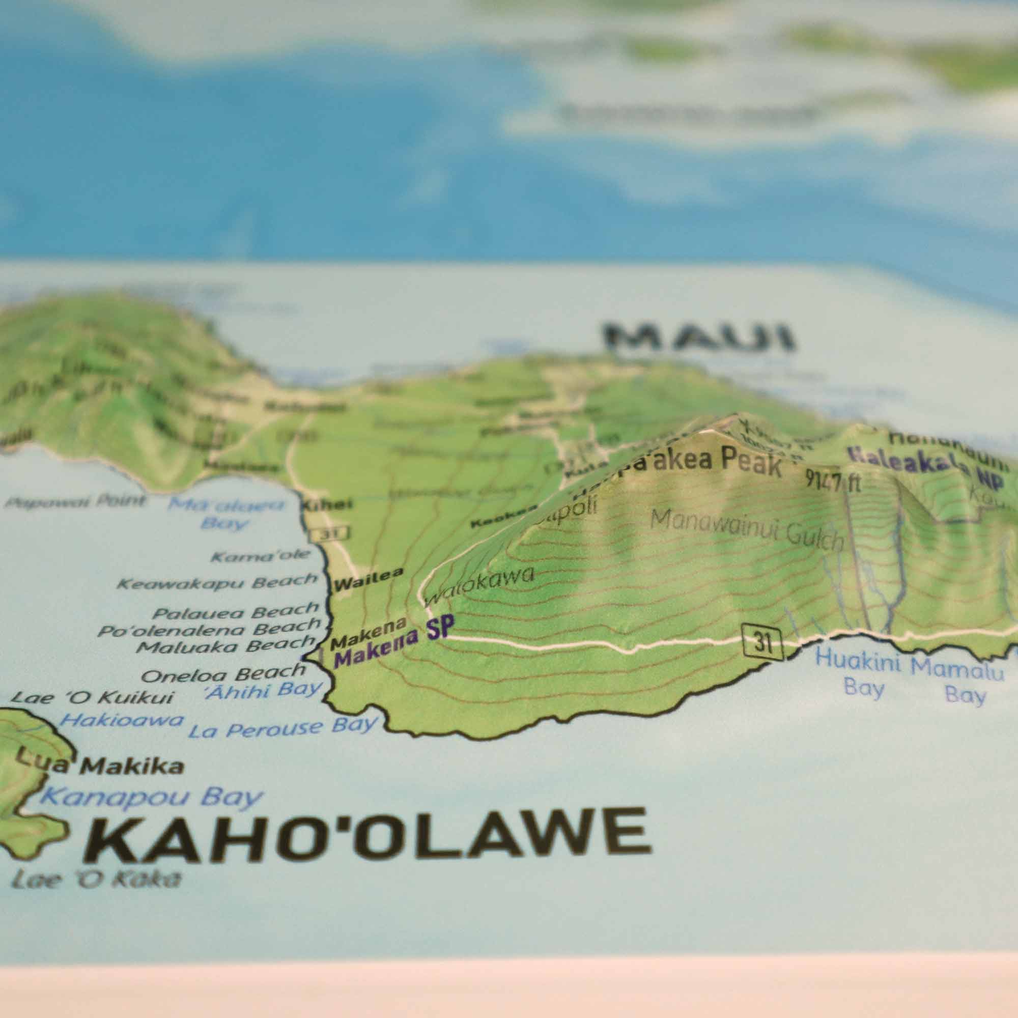 Hawaii Raised Relief 3D Map showcasing detailed topography with lush valleys, volcanic peaks, and rugged coastlines, perfect for educators, adventurers, and geography enthusiasts interested in Hawaii's natural beauty and cultural heritage.