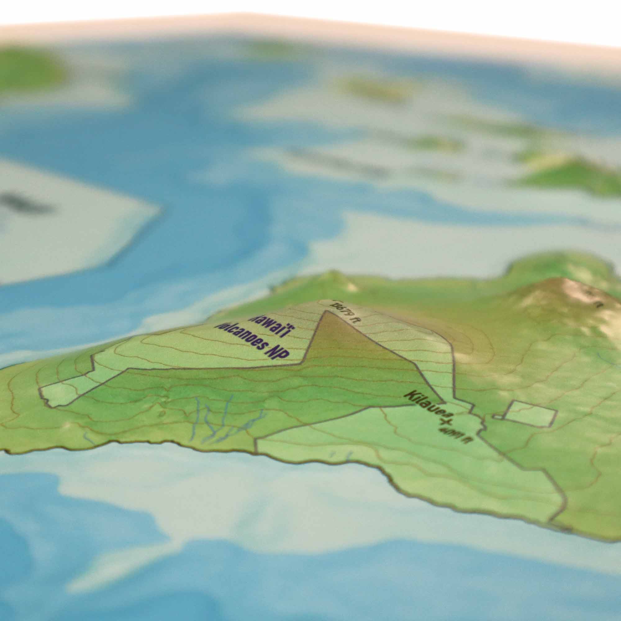 Hawaii Raised Relief 3D Map showcasing detailed topography with lush valleys, volcanic peaks, and rugged coastlines, perfect for educators, adventurers, and geography enthusiasts interested in Hawaii's natural beauty and cultural heritage.